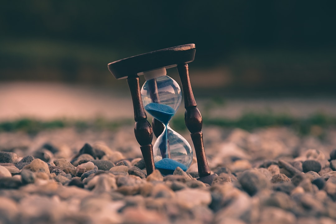 hourglass representing patience and divine timing in manifestation